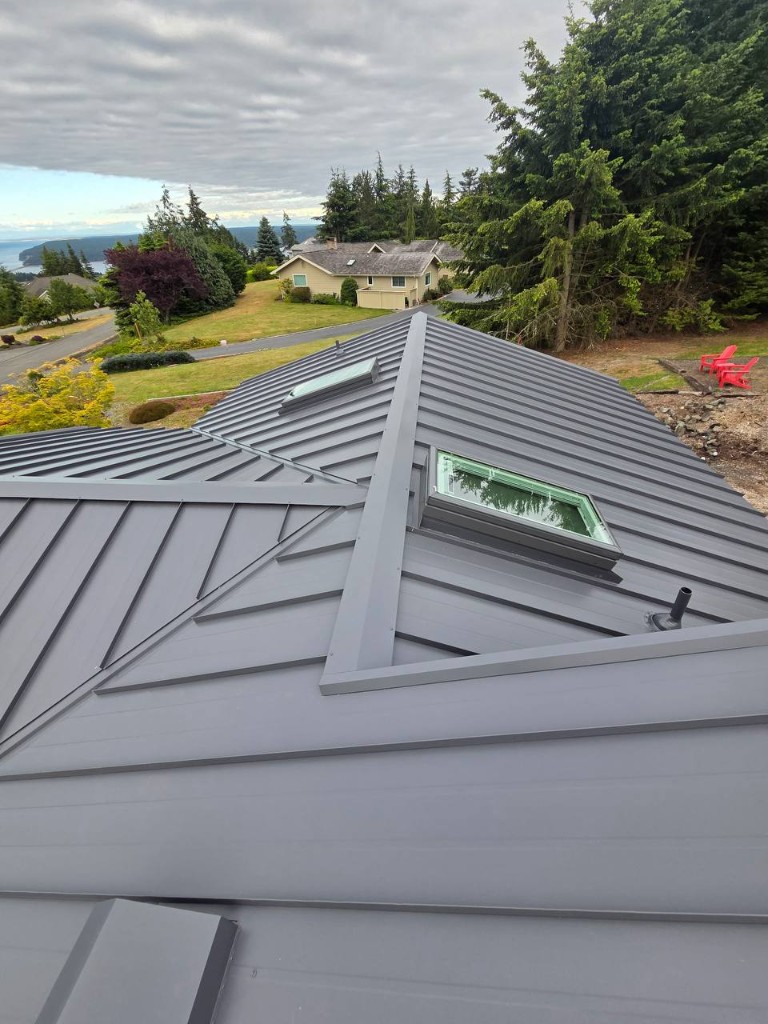 Ridge cap installation on standing seam metal roof