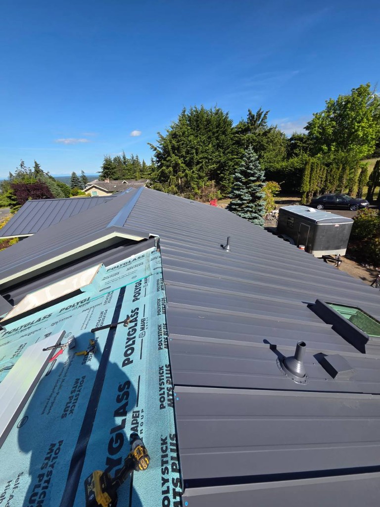 Standing seam metal roof with Polystick underlayment at panel transition