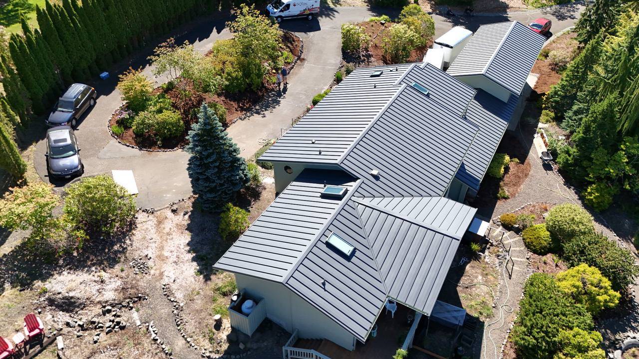 Charcoal standing seam metal roof on a residential home in Bothell