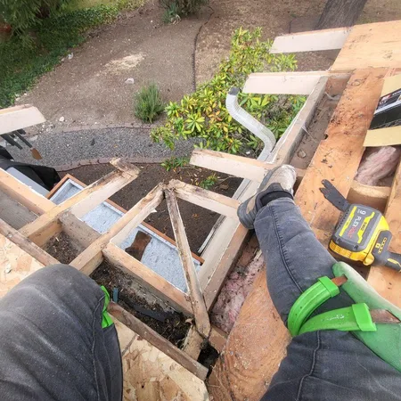 Storm damage assessment on a residential roof in Greater Seattle