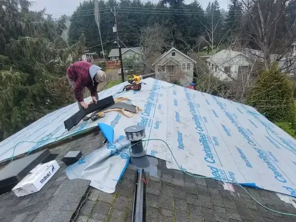 Permanent repair after temporary storm cover in Greater Seattle