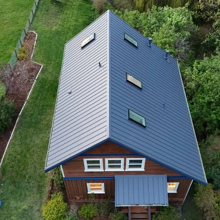 Metal roof valley detail with skylight flashing
