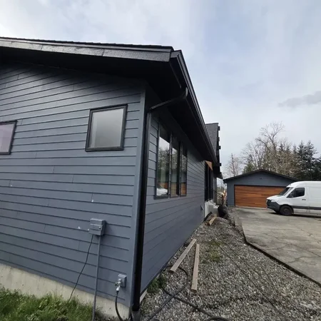 Completed gutter repair project along a home eave in King County