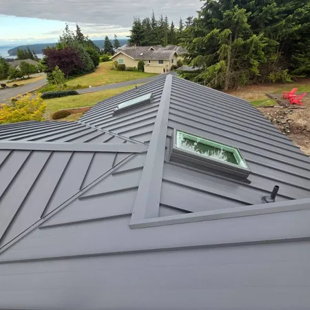 Ridge cap installation on standing seam metal roof