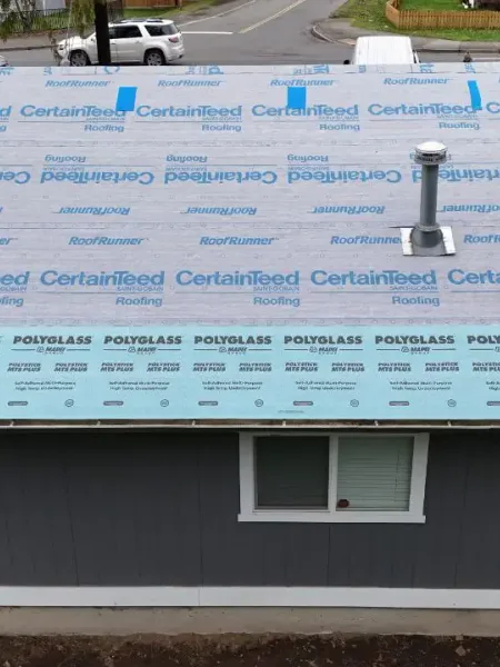 Construction Elite crew on a residential shingle job in King County