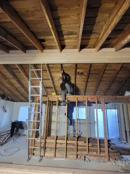 Crew inspecting wind damage on a Seattle-area home