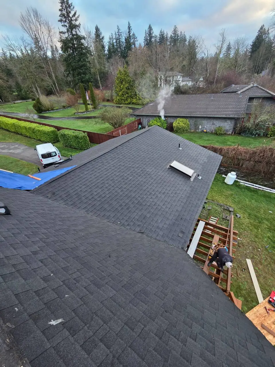Architectural shingle installation with skylight