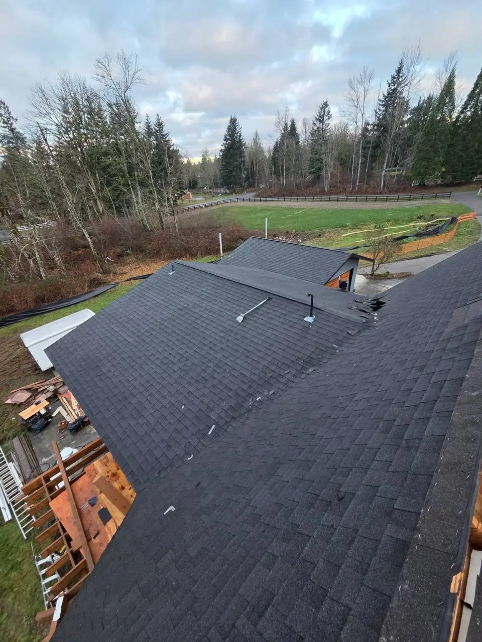 Charcoal architectural shingles in progress