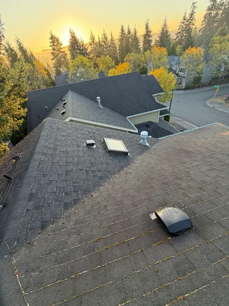 Completed gray architectural shingles after residential repair