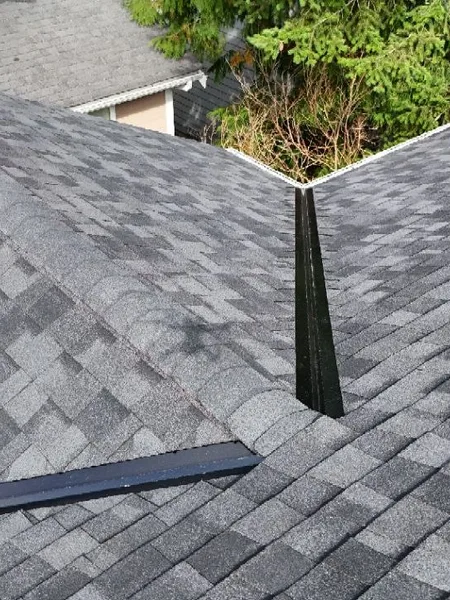 Deep roof valley finished after residential shingle repair