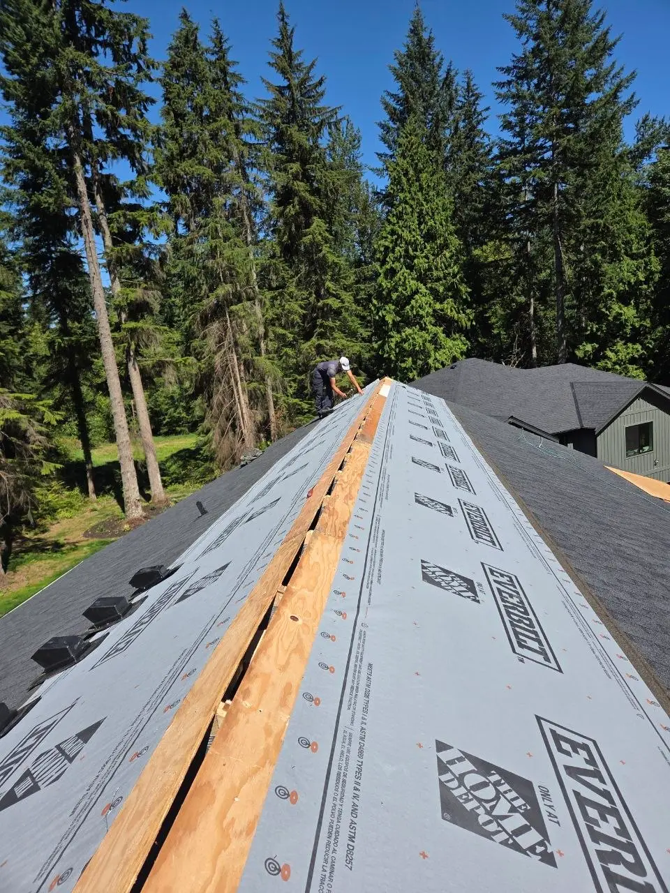 Ridge underlayment everbilt shingle install in progress in Bothell