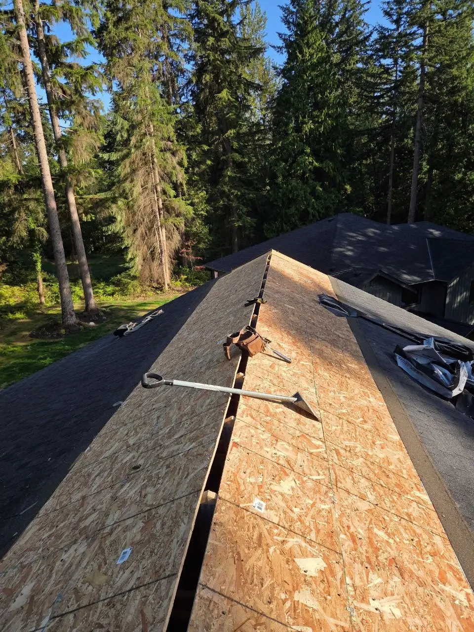 OSB sheathing tear-off tool on the deck