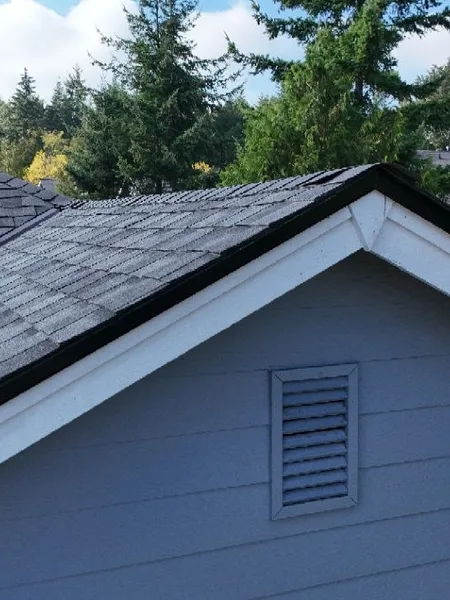 Gable edge and eave detail on a completed shingle installation
