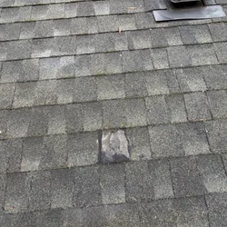 Close-up texture of newly installed architectural asphalt shingles