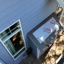 Synthetic underlayment installed ahead of architectural shingles