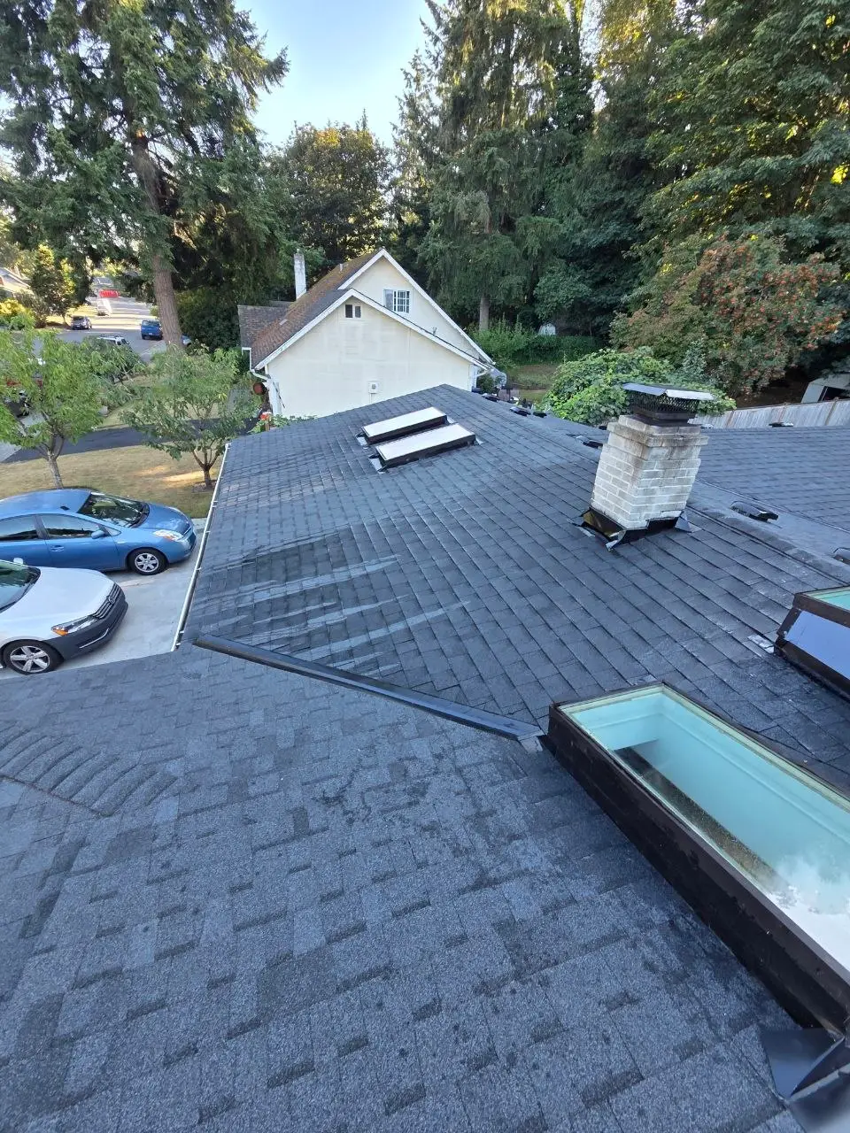 Shingle roof skylights chimney flashing valley in Everett