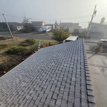 Finished architectural shingles on a residential slope