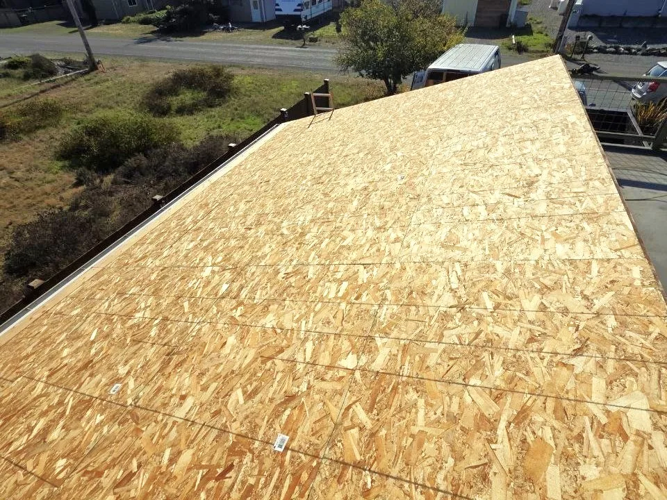 New OSB roof deck during a roof replacement